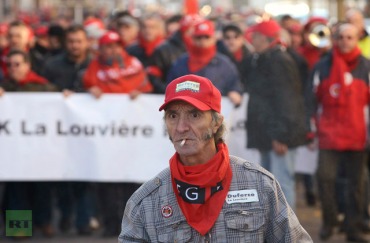 Belgian workers take part in a demonstration during an European strike in La Louviere