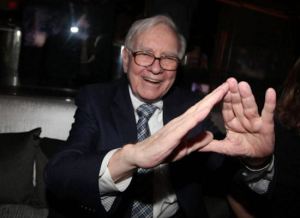 Warren Buffet Displaying The Symbol Of The Illuminati Banker's Boys Club..