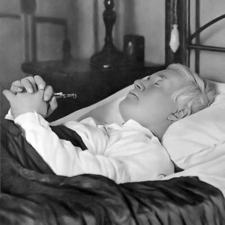 Pope Pius X died in the early hours of August 20, 1914. His last act was to kiss the crucifix he is shown holding. In the sleep of death his countenance was peaceful and almost seemed youthful again.