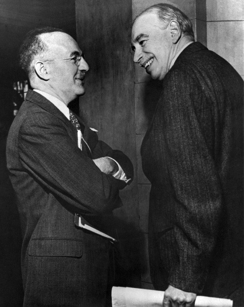 Convicted Soviet Spy Harry Dexter White (left) and John Maynard Keynes (right) at the Bretton Woods Conference conspiring Rothschild's Private Federal Reserve 1913.