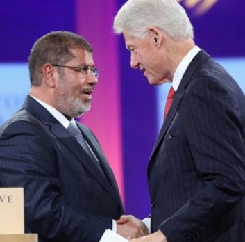 Overthrown illuminati goon Mohamed Morsi of Egypt's Obama Muslim Brotherhood & Clinton. Morsi is now in prison in Egypt for murder and inciting violence.